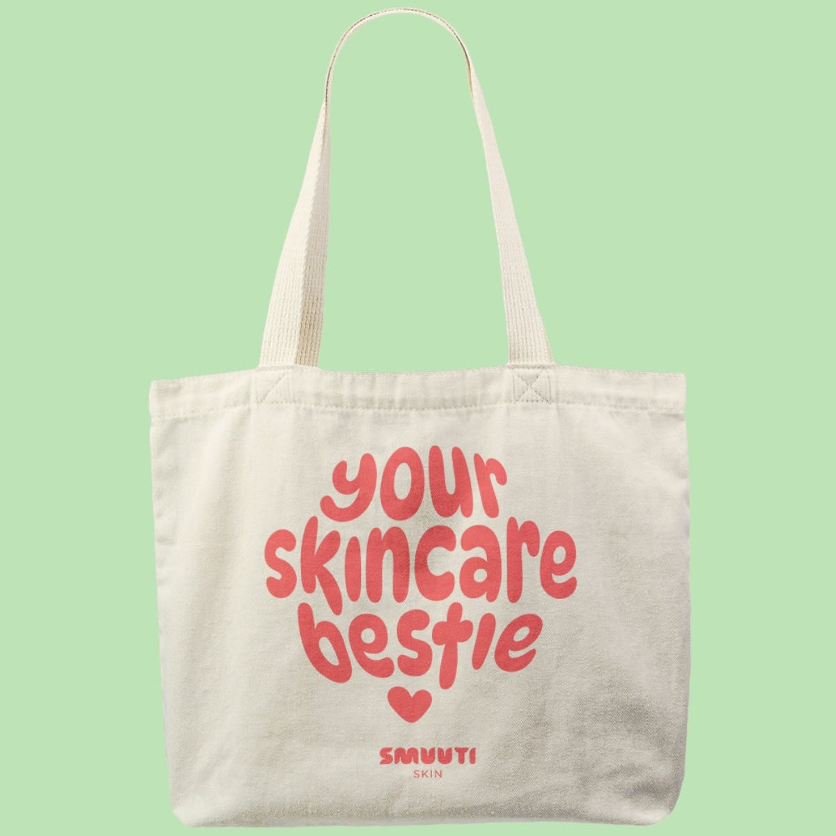 Tote bag with 'your skincare bestie' text on a light green background